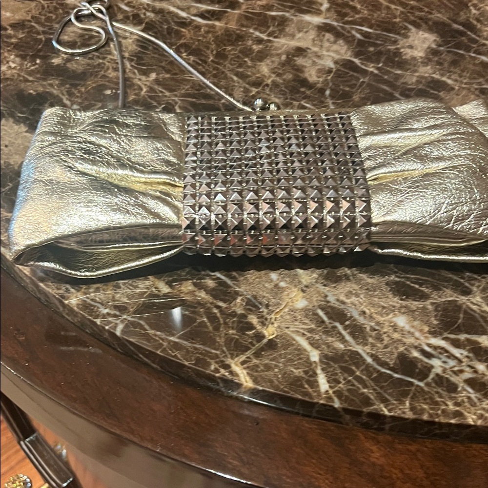 Stud-Front Metallic Silver Wristlet Clutch